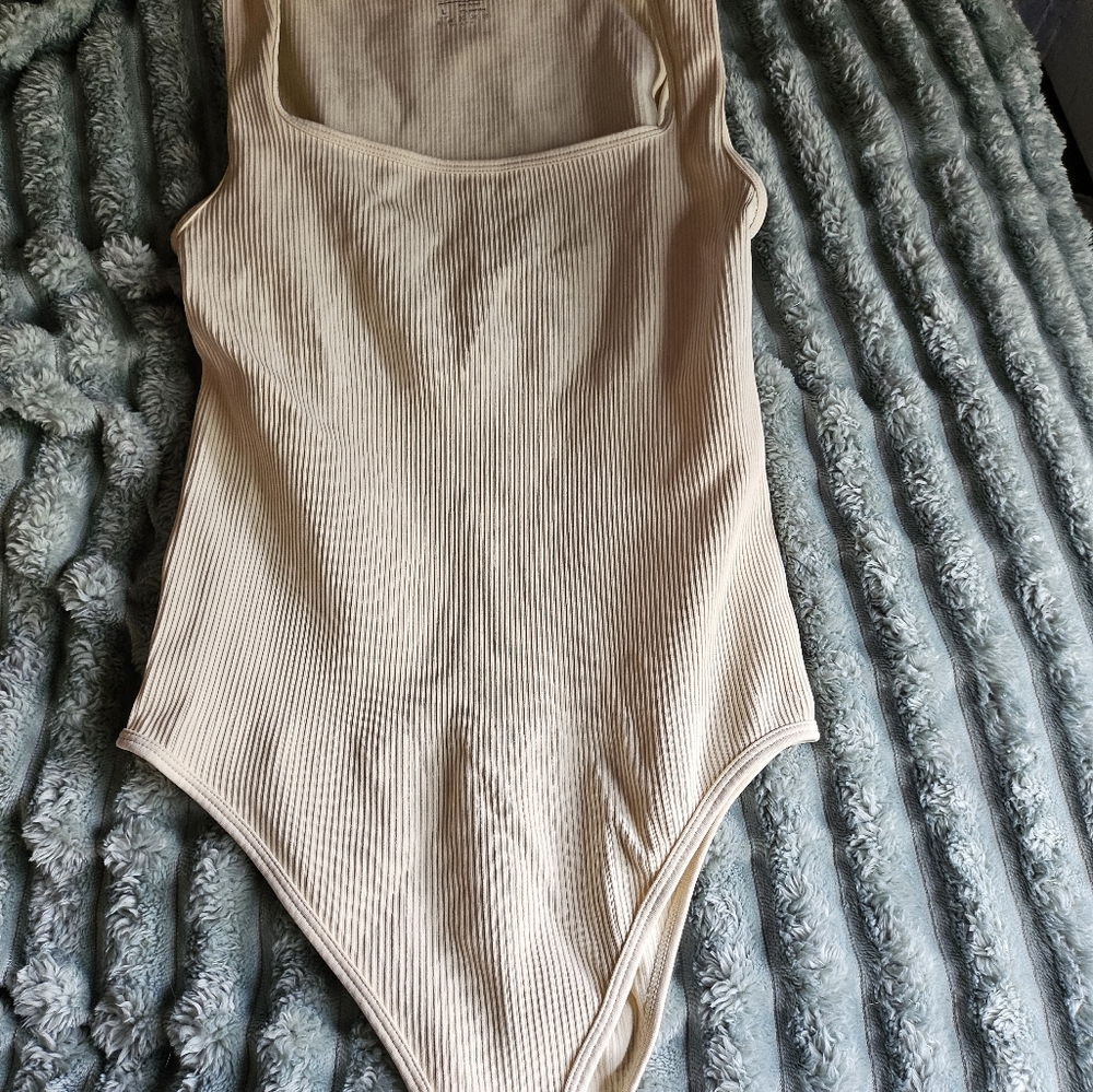 Cream Asymmetrical Sleeveless Bodysuit